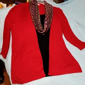 A  Red Ribbed Sweater Jacket, and a  Black Tank. For a dresser look a Scarf